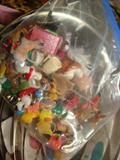 Bag of smalls including doll house pieces and Cracker Jack toys