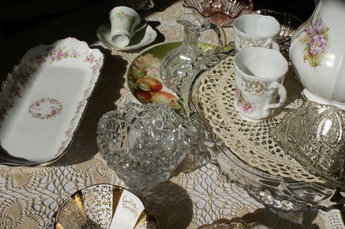 Bone china, crystal, crocheted table linens