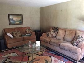 another family room set glass coffee table and area rug