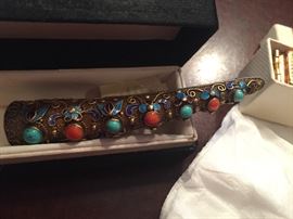 Turquoise and silver nail cover pin