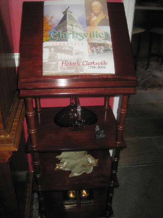 Library stand with 3 shelves and 'Historic Clarksville' book