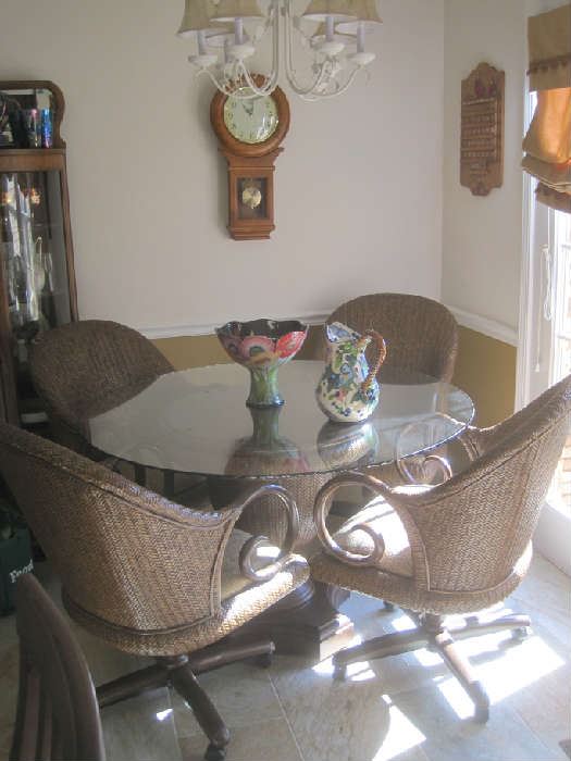 Lovely round glass top crimped edge table/ 4 chairs on rollers - bowl and pitcher signed  by J. McCall