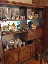 One of 2 beautiful wall units/room dividers full of collectibles! Tea cups, vases and more!