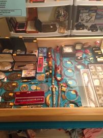 Small collectibles and jewelry! Large selection of men's belt buckles and watches!
