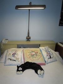 Left Back Bedroom--Pillows, stuffed cat, lamp, double bed