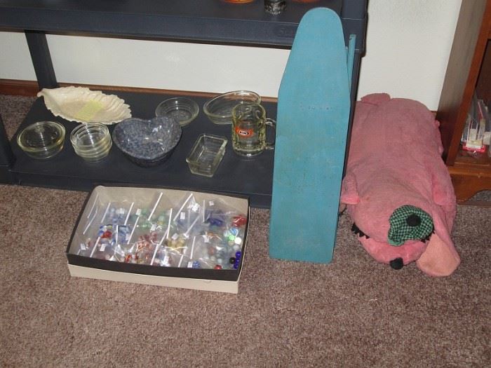 Living Room--More stuff, marbles, childs ironing board, stuffed animal