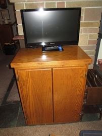 Living Room--Panasonic tv, Oak cabinet