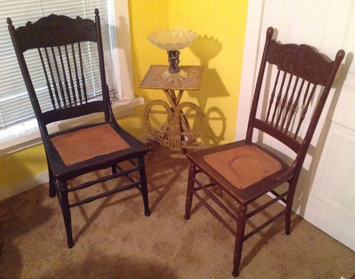 Two old chairs and decorative wicker table
