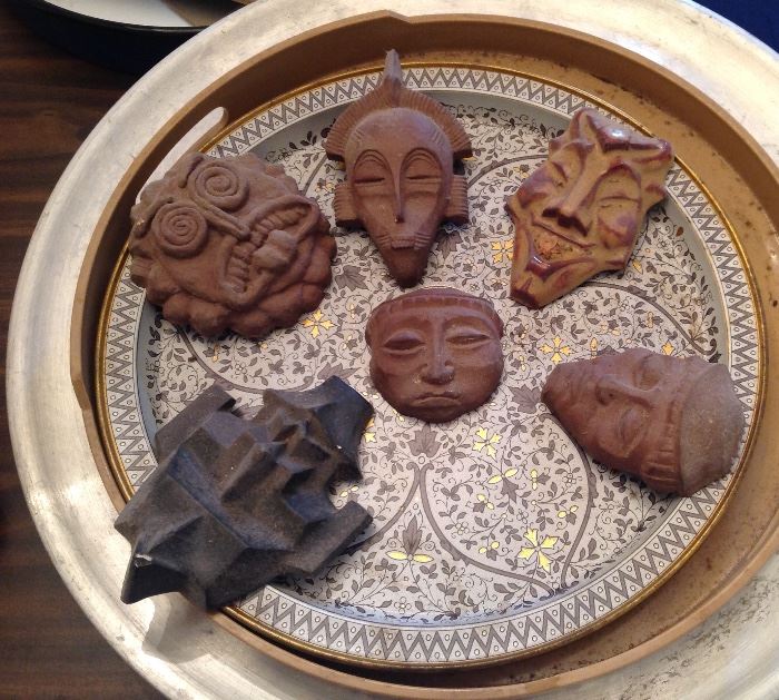 Collection of pottery faces
