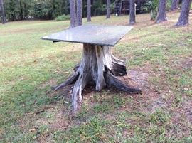 Tree stump table with granite top