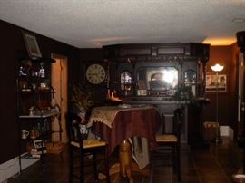 Antique/Vintage Tavern/pub bar....includes front and back bar with mirror and overhead for holding glasses and lighting. Overhead connects the front and back.