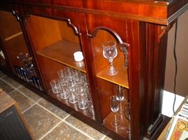 Antique/Vintage Tavern/pub bar....includes front and back bar with mirror and overhead for holding glasses and lighting. Overhead connects the front and back.