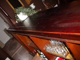 Antique/Vintage Tavern/pub bar....includes front and back bar with mirror and overhead for holding glasses and lighting. Overhead connects the front and back.