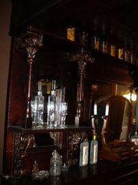 Antique/Vintage Tavern/pub bar....includes front and back bar with mirror and overhead for holding glasses and lighting. Overhead connects the front and back.