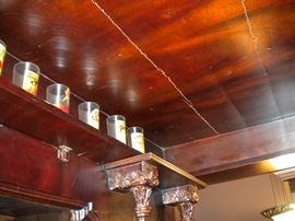 Antique/Vintage Tavern/pub bar....includes front and back bar with mirror and overhead for holding glasses and lighting. Overhead connects the front and back.