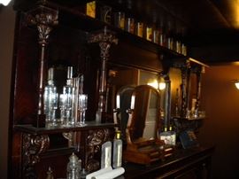 Antique/Vintage Tavern/pub bar....includes front and back bar with mirror and overhead for holding glasses and lighting. Overhead connects the front and back.