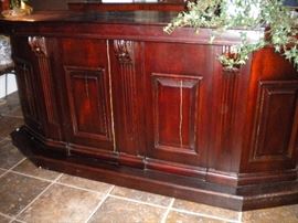 Antique/Vintage Tavern/pub bar....includes front and back bar with mirror and overhead for holding glasses and lighting. Overhead connects the front and back.