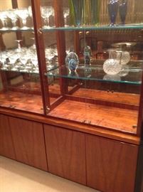 Henredon koa wood Modern break front, German cut Crystal stemware, Continental silver and cut Crystal pitcher, art glass pieces