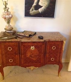 Early 20thc inlaid French marble top commode with ormolu