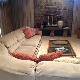 Modern velour sectional sofa, smoked glass top coffee table