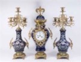 Antique French bronze and porcelain clock set