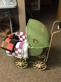 Antique baby buggy and antique/vintage doll quilts