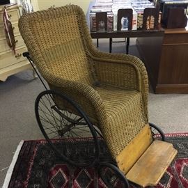 Antique wicker wheel chair