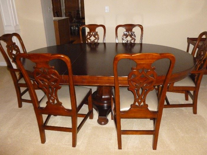 Really nice Dining Room Table w/6 chairs & another leaf..from the Martha Stewart Collection..Client called it 'prison furniture'