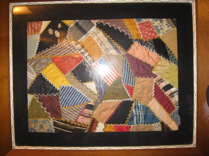 Feather stitched partial quilt in frame