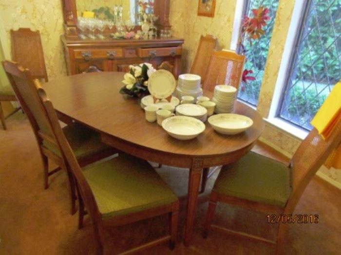 Formal Dining Table with 6 chairs and 1 leaf.