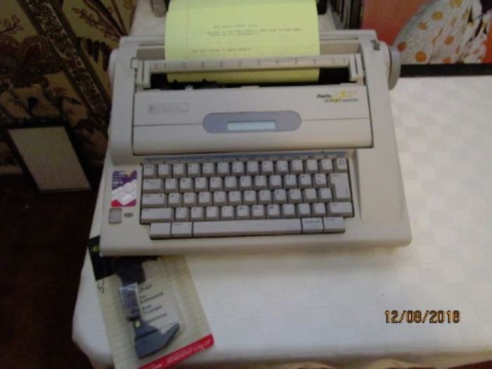 Smith Carona Typewriter in excellent condition and works!  Come type Santa a letter...