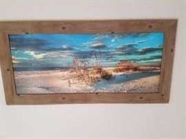 Large photograph of beach.  Looks like Fort Myers Beach when I was a kid.........No condos:)
