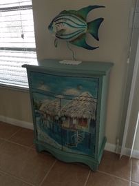 This is a very gorgeous hand painted cabinet and fish sculpture