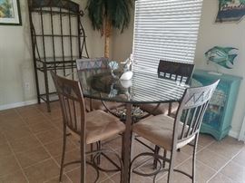 Small dining set with matching bakers rack with wine and wine glass holders