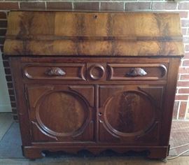 Late 1880s drop front Oak desk with burled wood front