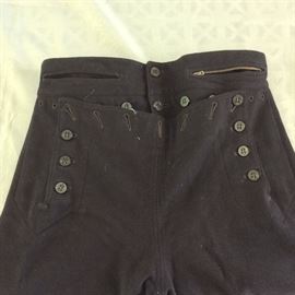 13 button pants. Second pair with zippered pocket. 
