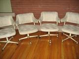 Four Modern chairs with rollers