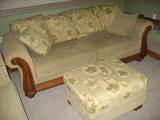 Two almost new sofas with lots of cushions and hassock.