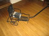 Metal child's stroller. Over 90+ years old.