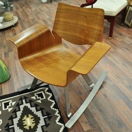 This current day modern design rocker is known as the Buttercup chair.  This very comfortable chair retails for $900 but is a fraction of that at the sale.