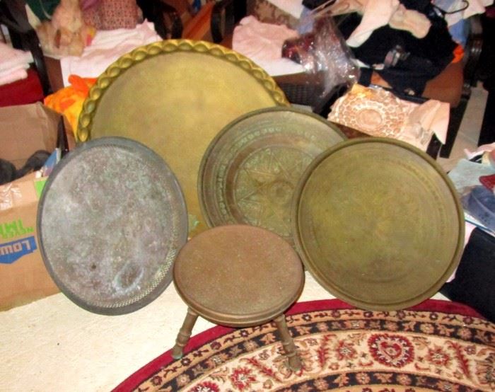 Islamic foot warmer and giant bras serving trays with engraved motifs. Need a good cleaning. From Turkey and Middle East