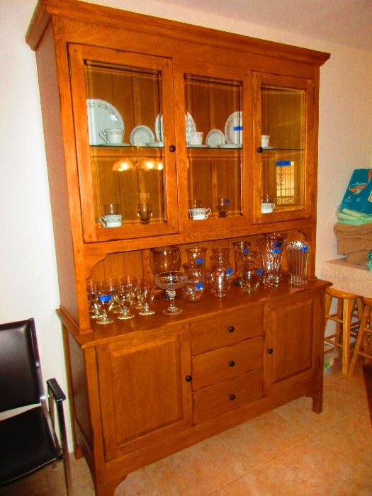 Solid Oak lighted china cabinet