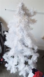 small white Christmas tree.  Small selection of holiday items