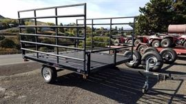 Flatbed trailer with sides