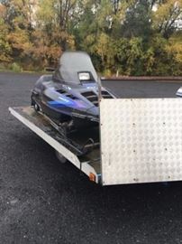 Snowmobile and trailer