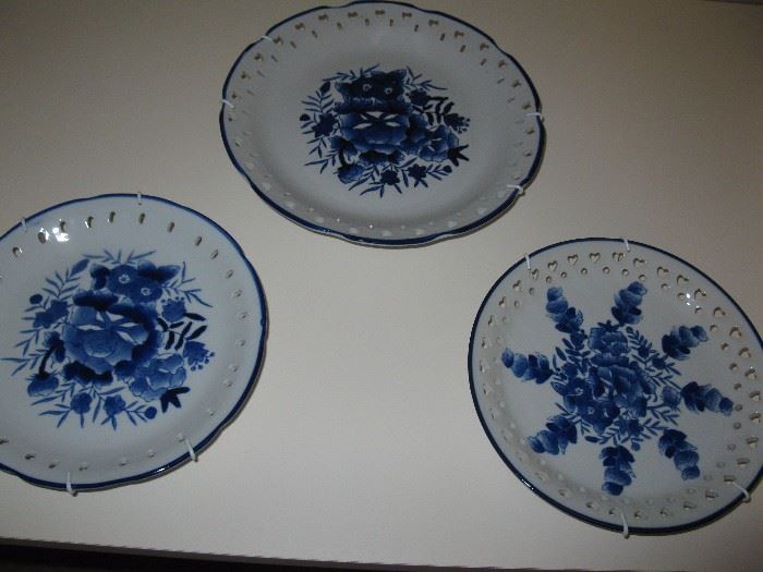Blue & white plates with plate hangers