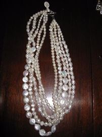 Seed pearl necklace with sterling clasp.