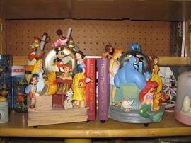 Disney Through the Years vol. 1 & 2 musical and glitter globe statues