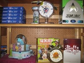 Blank 6 hour VHS tapes, DePaul University clock, Star Trek: The Next Generation 20th anniversary edition DVD collection, Monsters Inc. music box and glitter globe statue, Buffy the Vampire Slayer season 1-7 DVD set, WKRP in Cincinatti The complete DVD set,  Sex and the City the complete DVD series.