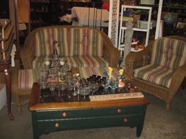 lawn furniture including chair, couch and ottoman, coffee table